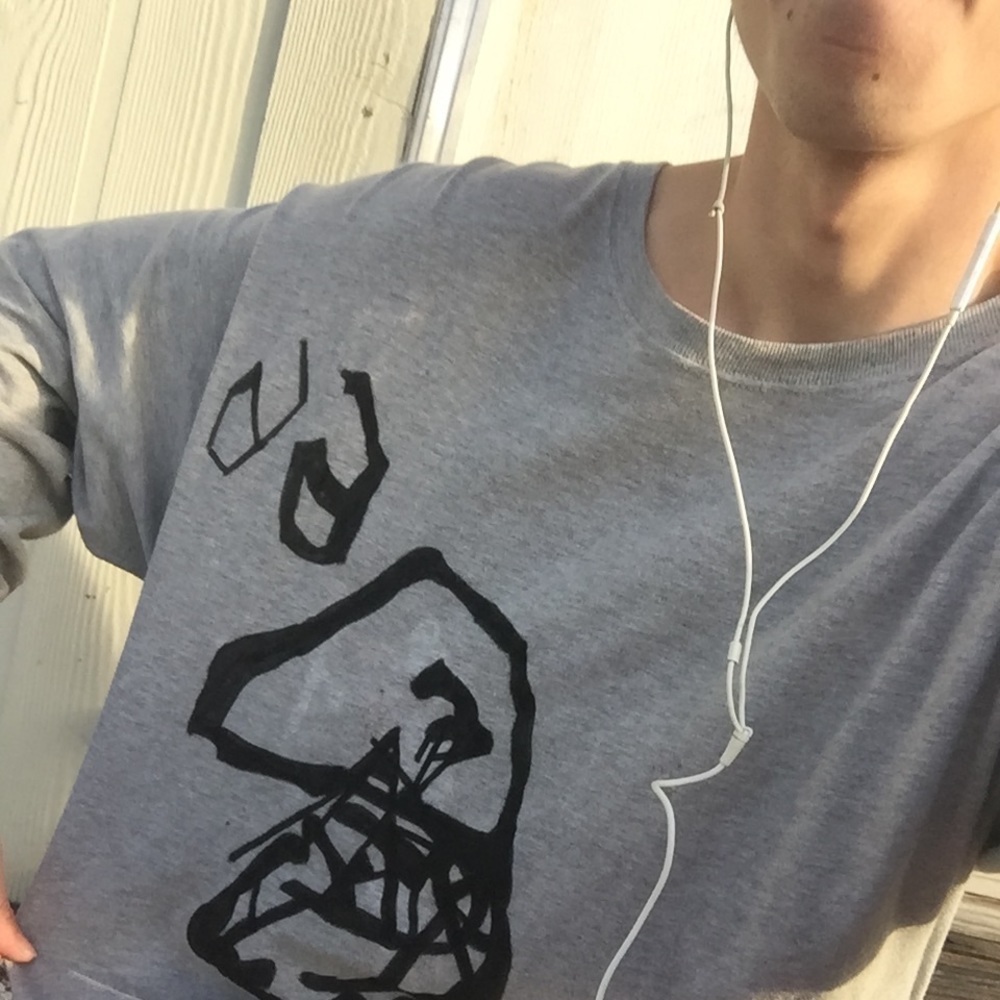 A sweater wit original artwork by flame...VX